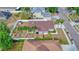 Aerial view of a single Gathering house with backyard, patio, and privacy fence at 427 Highland Meadows St, Davenport, FL 33837