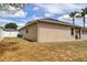 Back of house featuring a covered patio, grill and privacy fence at 427 Highland Meadows St, Davenport, FL 33837