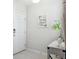 Bright entryway featuring a modern door, stylish decor, and a welcoming atmosphere at 427 Highland Meadows St, Davenport, FL 33837
