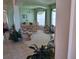 Bright and inviting dining room with large windows and elegant décor at 450 Morning Blossom Ln, Oviedo, FL 32765