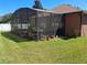 A large screened lanai with shade to keep you cool and plenty of room to stretch out at 450 Morning Blossom Ln, Oviedo, FL 32765