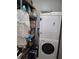 Laundry room with a stacked washer and dryer unit at 450 Morning Blossom Ln, Oviedo, FL 32765