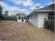 Exterior view of backyard with screened in patio and room for endless possibilities at 4736 Southold St, Orlando, FL 32808