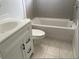 Bathroom featuring a combination tub/shower and a vanity sink at 4736 Southold St, Orlando, FL 32808