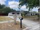 Charming single-story home with a well-manicured lawn and mailbox on post at 4736 Southold St, Orlando, FL 32808