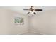 Bright bedroom features tile floors, a ceiling fan and a window to let in plenty of light at 4800 Beacon St, Orlando, FL 32808
