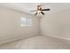 Bright bedroom features tile floors, a ceiling fan and a window to let in plenty of light at 4800 Beacon St, Orlando, FL 32808