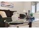 Cozy living room featuring modern decor, a glass coffee table, and natural light creating a relaxing environment at 4800 Beacon St, Orlando, FL 32808