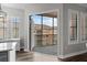 Open balcony view showcasing the architecture of the adjacent buildings and sunny blue skies at 501 Mirasol Cir # 519, Celebration, FL 34747