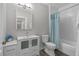 Bathroom featuring a white vanity with sink, toilet, and a shower with a decorative curtain at 501 Mirasol Cir # 519, Celebration, FL 34747