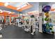Community gym with modern fitness equipment and weights, surrounded by bright lighting and colors at 501 Mirasol Cir # 519, Celebration, FL 34747