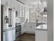 Modern kitchen with stainless steel appliances, white cabinetry, and ample counter space at 501 Mirasol Cir # 519, Celebration, FL 34747