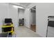 Basement storage room featuring concrete flooring, painted walls, shelving, and access to another room at 501 Mirasol Cir # 519, Celebration, FL 34747