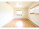 Spacious bedroom with natural lighting and hardwood floors offers comfort and style at 532 Madison Ave, Orlando, FL 32805