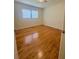 Bedroom with hardwood floors and a window providing natural light at 532 Madison Ave, Orlando, FL 32805