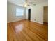 Bedroom with hardwood floors, closet and natural light at 532 Madison Ave, Orlando, FL 32805