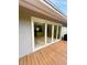These sliding glass doors give you access to the wood deck and an extension of the living space at 532 Madison Ave, Orlando, FL 32805