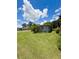 Quaint home exterior with a well-kept lawn and mature trees at 532 Madison Ave, Orlando, FL 32805