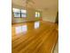 Inviting living room showcasing hardwood floors and ample natural light, creating a warm and welcoming atmosphere at 532 Madison Ave, Orlando, FL 32805