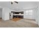 Open-concept kitchen with stainless steel appliances and ample counter space at 597 Madison Dr, Davenport, FL 33837