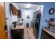 Galley-style kitchen with stainless steel appliances and modern finishes at 620 E Church Ave, Longwood, FL 32750