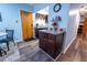 Charming kitchen area with dark cabinets, a butcher block countertop, and stainless steel sink at 620 E Church Ave, Longwood, FL 32750
