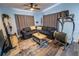 Comfortable living room with a ceiling fan and modern decor at 620 E Church Ave, Longwood, FL 32750