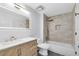 Bathroom featuring white countertops, bathtub with golden hardware, and an illuminated mirror at 6685 Queens Borough Ave # 202, Orlando, FL 32835