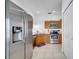 Bright kitchen features stainless steel appliances and plenty of cabinet space at 8118 Fan Palm Way, Kissimmee, FL 34747
