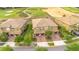 Aerial view of the home showcases its location near a lush golf course at 9044 Azalea Sands Ln # 4011, Davenport, FL 33896