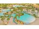 Resort-style pool area with multiple pools, lazy river, and tropical landscaping at 9044 Azalea Sands Ln # 4011, Davenport, FL 33896