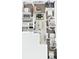 Bird's-eye view of a home's floor plan, highlighting multiple bedrooms, bathrooms, a living area, and a kitchen with island at 9188 Chandler Dr, Groveland, FL 34736