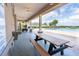 Community poolside covered area with picnic tables, ceiling fans, and a refreshing water fountain at 9188 Chandler Dr, Groveland, FL 34736