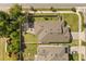 Aerial view of the home highlighting the backyard layout and landscaping at 951 Cutke Rd, St Cloud, FL 34771