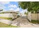Spacious backyard features a privacy fence, open patio, and manicured lawn at 951 Cutke Rd, St Cloud, FL 34771