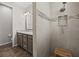 Bathroom has a tiled shower with showerhead and seat, with a vanity area with granite at 951 Cutke Rd, St Cloud, FL 34771