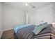 Bedroom featuring a ceiling fan, closet, and hardwood floors at 951 Cutke Rd, St Cloud, FL 34771