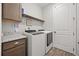 Laundry room featuring a modern washer and dryer at 951 Cutke Rd, St Cloud, FL 34771