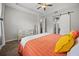 Main bedroom with an ensuite bathroom, lots of dresser space, and a tray ceiling at 951 Cutke Rd, St Cloud, FL 34771