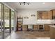 A modern office area is conveniently located next to the kitchen, featuring built-in shelving at 951 Cutke Rd, St Cloud, FL 34771