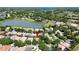 Aerial view shows the house nestled within a community with lake views at 1210 Pallister Ln, Lake Mary, FL 32746