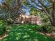 Charming single-story home with mature trees and lush green lawn at 1210 Pallister Ln, Lake Mary, FL 32746