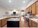 Modern kitchen showcasing granite countertops, stainless steel appliances, and a kitchen island at 1210 Pallister Ln, Lake Mary, FL 32746