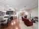 Open floor plan seamlessly integrating the dining area, living room, and kitchen, ideal for gatherings at 1210 Pallister Ln, Lake Mary, FL 32746