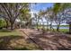Community playground near the lake providing a variety of recreation for families at 1210 Pallister Ln, Lake Mary, FL 32746
