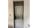 Efficient laundry closet with stacked washer and dryer, maximizing space in the home at 12539 Floridays Resort Dr 411 # 411D, Orlando, FL 32821