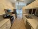 Well-equipped kitchen featuring stainless steel appliances and ample counter space at 2600 Cedar Bluff Ln, Ocoee, FL 34761