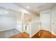 Hallway showcasing multiple doors and staircase at 8812 Kensington Ct, Kissimmee, FL 34747