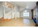 Bright living room featuring an open floor plan with tile flooring and natural light at 8812 Kensington Ct, Kissimmee, FL 34747