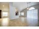 Open-concept view into the kitchen offering plenty of space and great natural light at 8812 Kensington Ct, Kissimmee, FL 34747